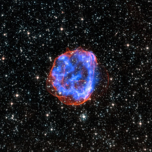 Los restos de una estrella que ha explotado en forma de supernova. Crédito: X-ray: NASA/CXC/Rutgers/J.Hughes; Optical: NASA/STScI