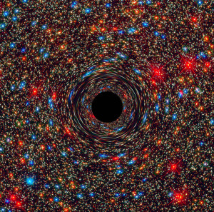 Esta simulación por ordenador muestra un agujero negro supermasivo en el núcleo de una galaxia. Crédito: NASA, ESA, y D. Coe, J. Anderson, y R. van der Marel (STScI)