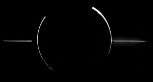 Jupiter, visto desde la sombra, con su sistema de anillos visible.