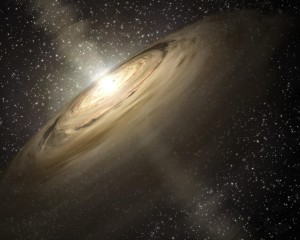 Concepto artístico de un disco de polvo y gas girando en torno a una estrella joven. Son los materiales primordiales para la formación de planetas. Nuestro Sistema Solar se formó de un disco similar capturado por el Sol. Crédito: NASA/JPL-Caltech