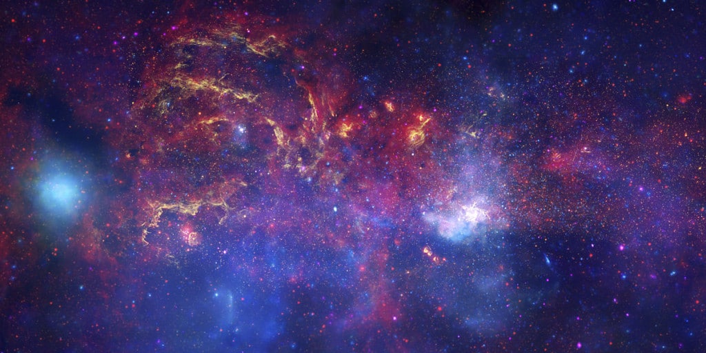 El centro de la Vía Láctea. Crédito: NASA/JPL-Caltech/ESA/CXC/STScI