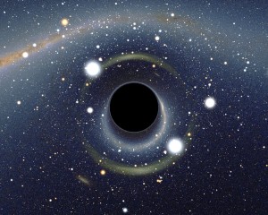 Esta imagen es una simulación de cómo veríamos la Gran Nube de Magallanes si hubiese un agujero negro entre nuestro planeta y la galaxia. Crédito: Alain R./Wikipedia
