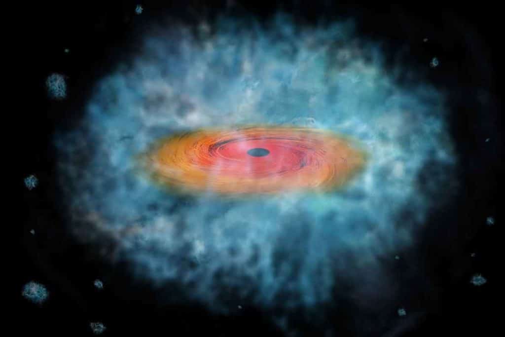 Concepto artístico de lo que podría ser un agujero negro supermasivo en proceso de formación. Crédito: NASA/CXC/M. Weiss